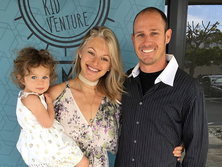 This undated photo provided by Cal Fire shows Fire Apparatus Engineer Corey Iverson, right, with his wife, Ashley, and their daughter. Iverson, who worked for the department's San Diego Unit as a member of a fire strike team, died Thursday, Dec. 14.